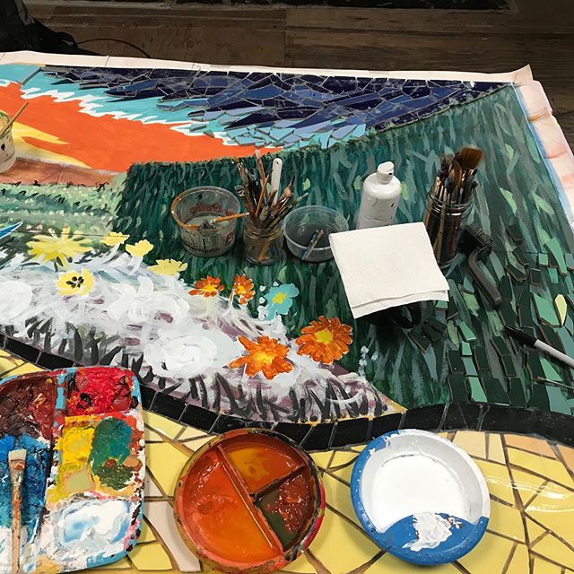 CPAG core artist Hector Duarte working on a mosaic mural for a Bickerdike Redevelopment Corp building in Humboldt Park honoring the author L. Frank Baum. #yellowbrickroad #wizardofoz #chicagopublicartgroup #hectorduarte #mosaicmural