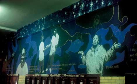 Words of Wisdom,  Faces of Youth, the Elements of Unity Combined at Austin Community Academy, 2002, acrylic paint on plaster, by Tracy Van Duinen